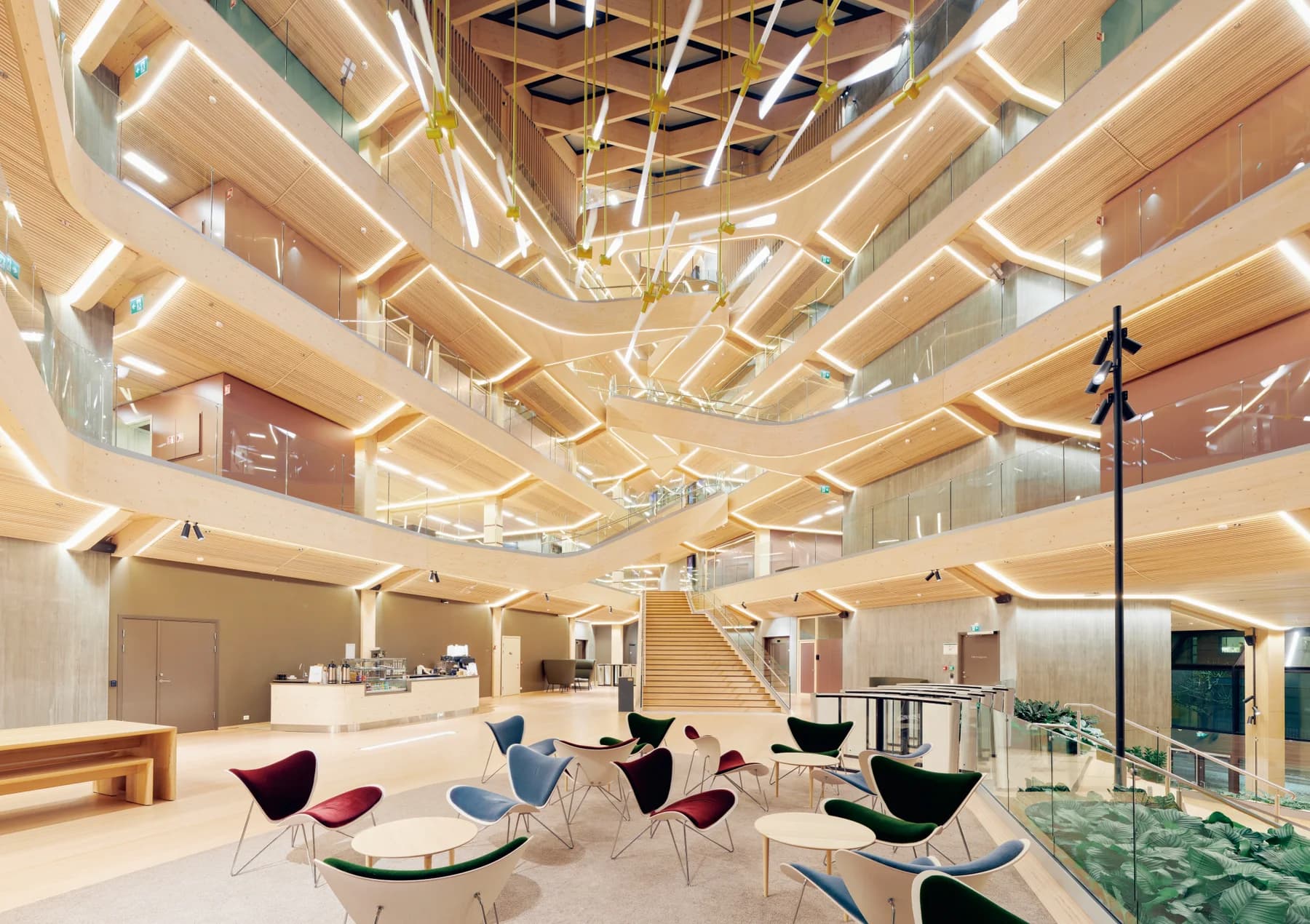 Seven-story timber atrium with hokon solid wood staircase